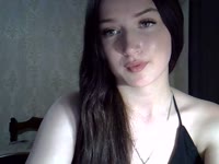 Hey, I’m LyraDream — not just a name, but a state of mind.My green eyes can be quiet… or very curious.I don’t undress — I unfold. Slowly. In words, in pauses, in a glance.
Once a girl with a football, now with a soft blanket, a cup of green tea, and a mood that knows how to tease in silence.I love morning light when everything is just beginning, and evening talks where there’s no “right,” only “real.”I sit in a cozy T-shirt, smiling with my eyes… and wondering — can you really watch when you’re not allowed to touch? Where would you take me first: Paris with a croissant, Tokyo with sake, or a private room where I look straight at you?Ask me a question, share a secret, play the quiet game — or just watch.